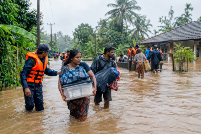 Flood Evacuation Through Tropical Village Waters